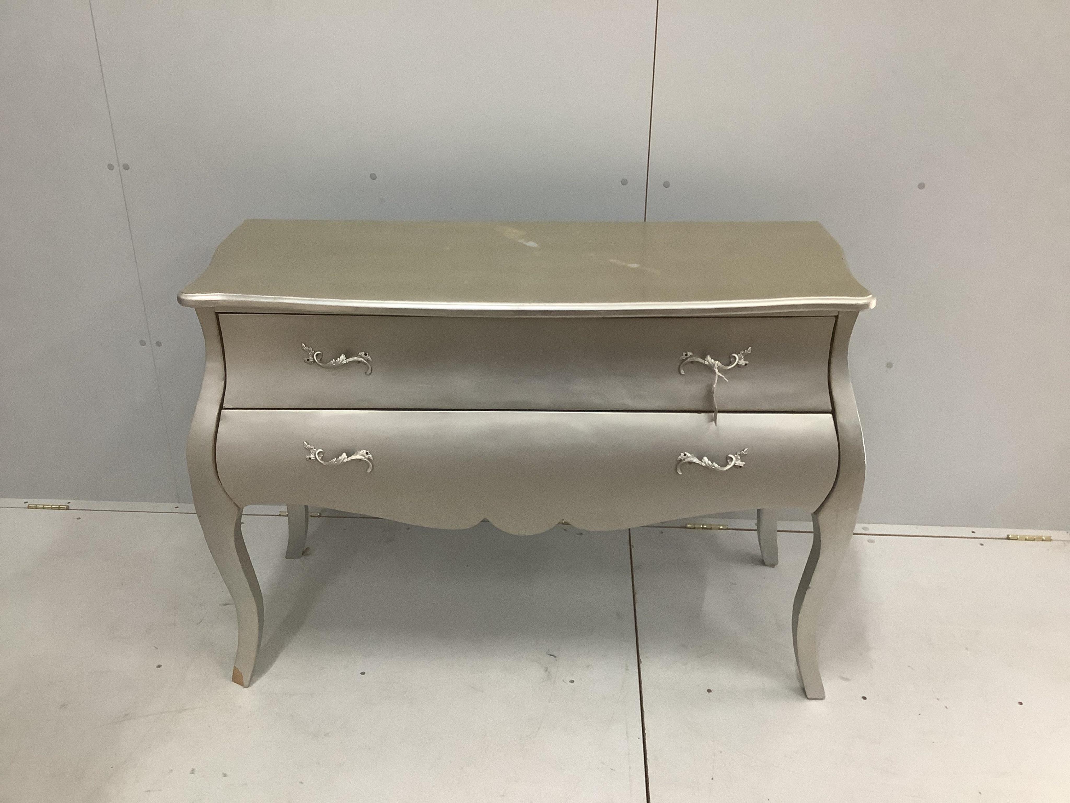 A Contemporary silver painted two drawer bombe chest, width 122cm, depth 49cm, height 85cm. Condition - fair